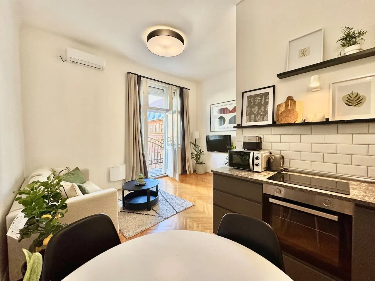 Living room and kitchen in a professionally managed premium apartment in District VIII, Budapest