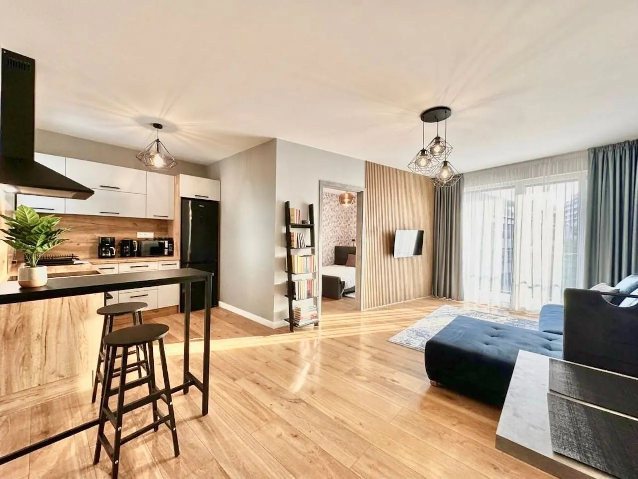 Kitchen and living area in a professionally managed premium apartment in Siófok, Hungary